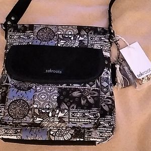 Sak roots crossbody w/ adjustable strap.